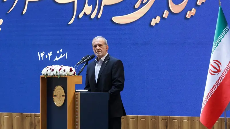 Iranian President Masoud Pezeshkian speaking during a televised address amid escalating Middle East tensions.